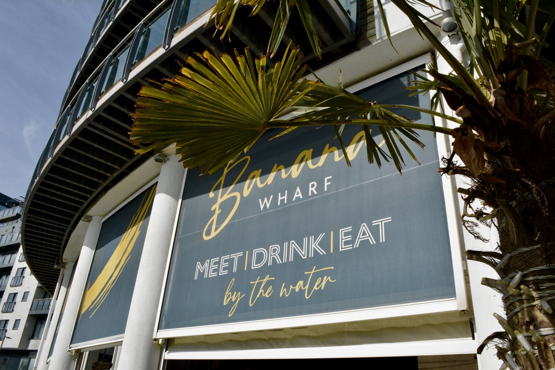 Banana Wharf signage at Ocean Village — MEET DRINK EAT by the water
